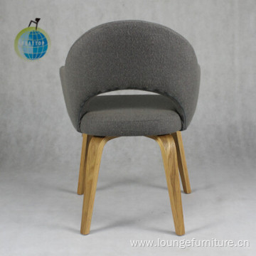 Upholstered chair with wood legs cafe dining style